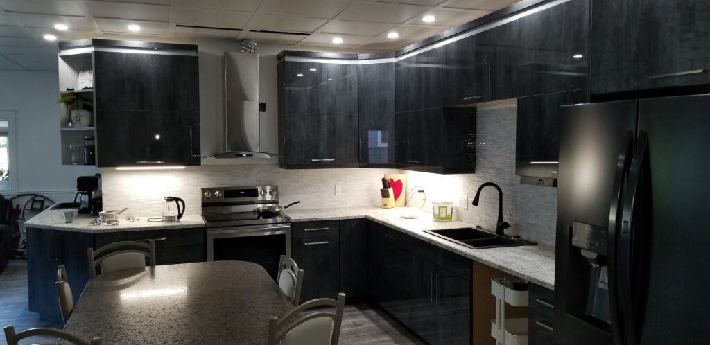Modern kitchen with dark grey cabinetry