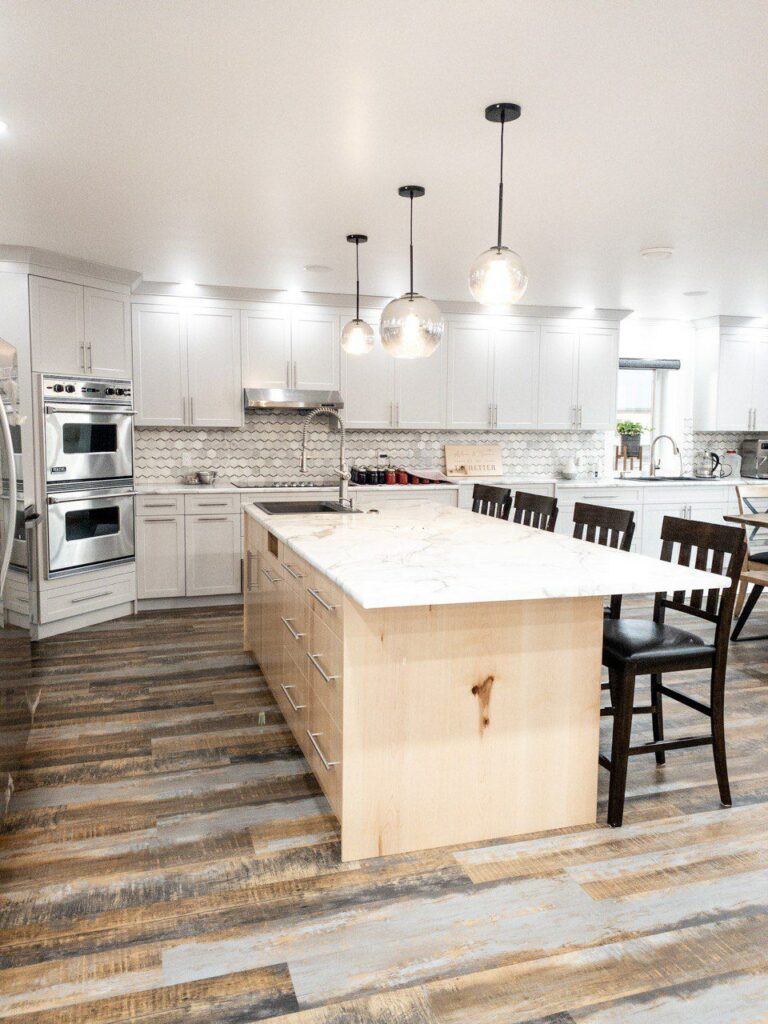 Large white cabinets in a contemporary home kitchen