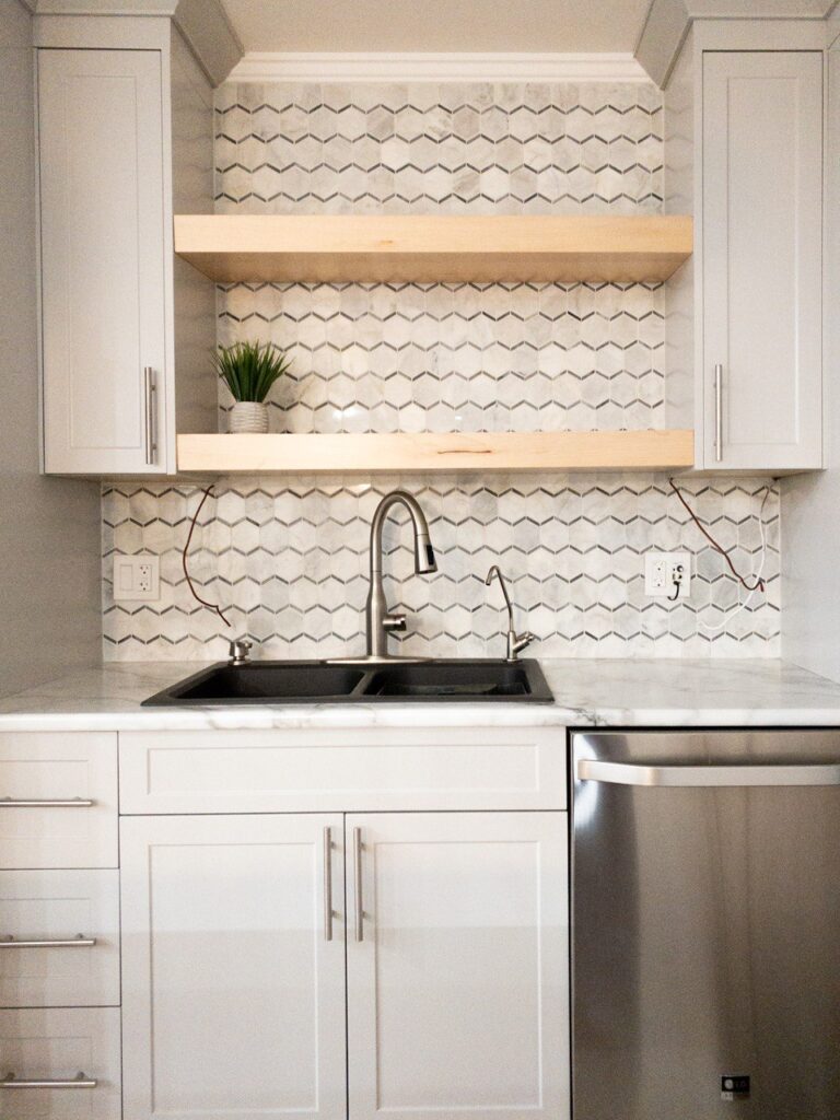 White kitchen cabinets with a glossy, modern look