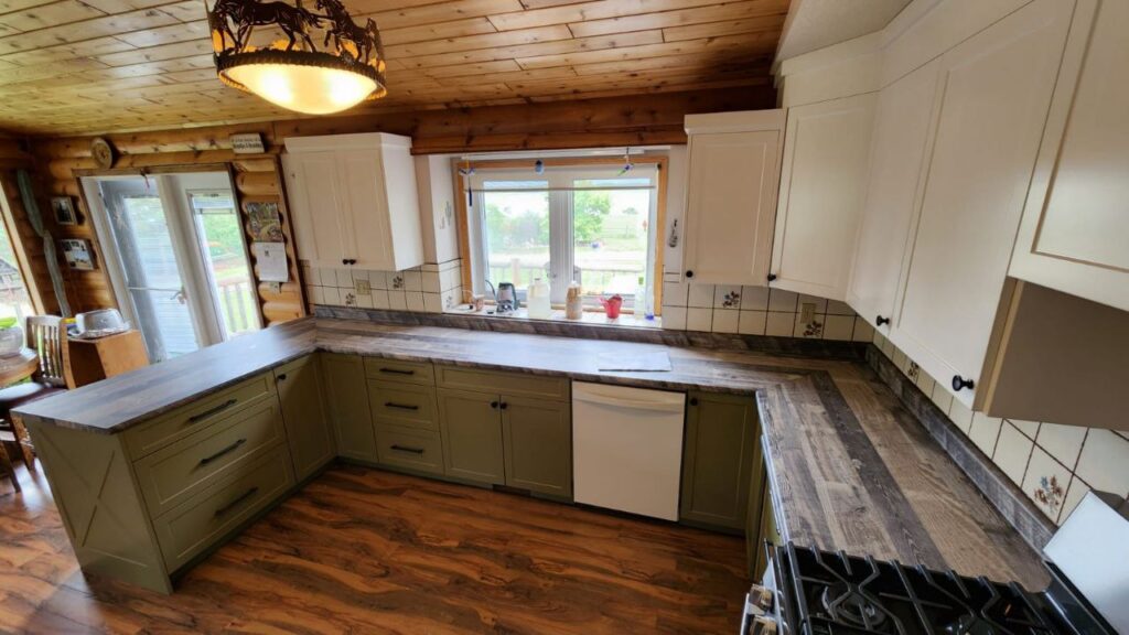 Mint coloured kitchen cabinets