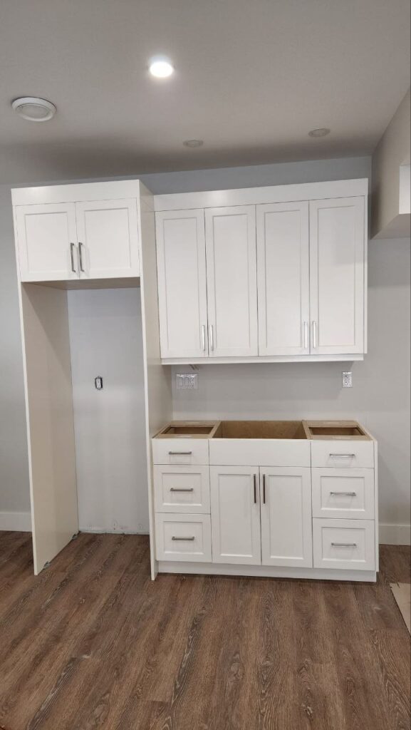 Bright white cabinets in a modern kitchen