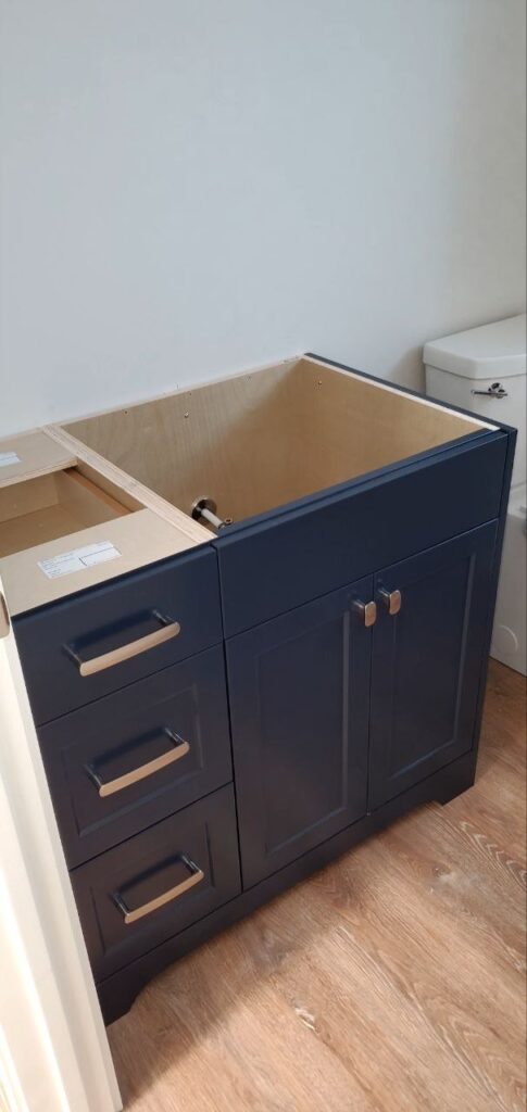 Livid colour storage cabinets in the toilet
