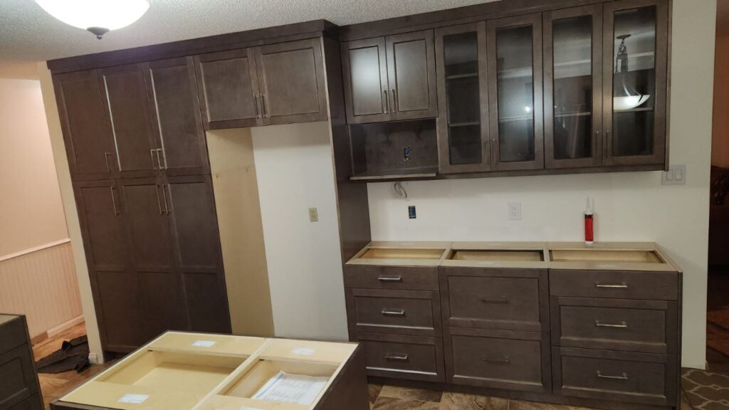 Tall storage cabinets in a home kitchen.