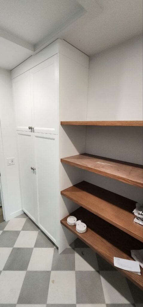 White entrance closet storage cabinets