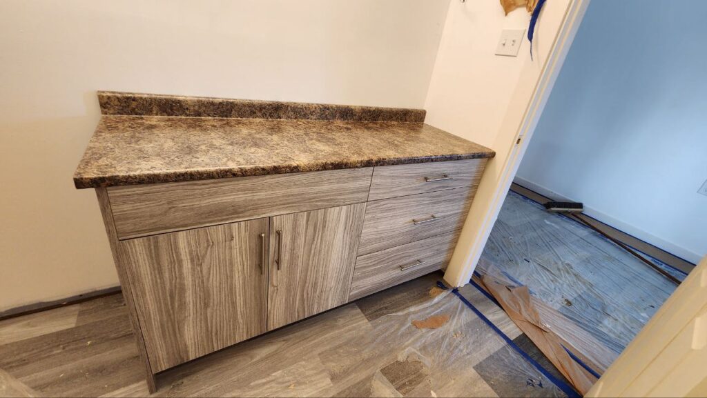 cabinets storage with granite countertops.