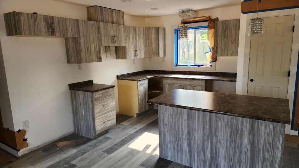 Marble stripe cabinets with brown countertop