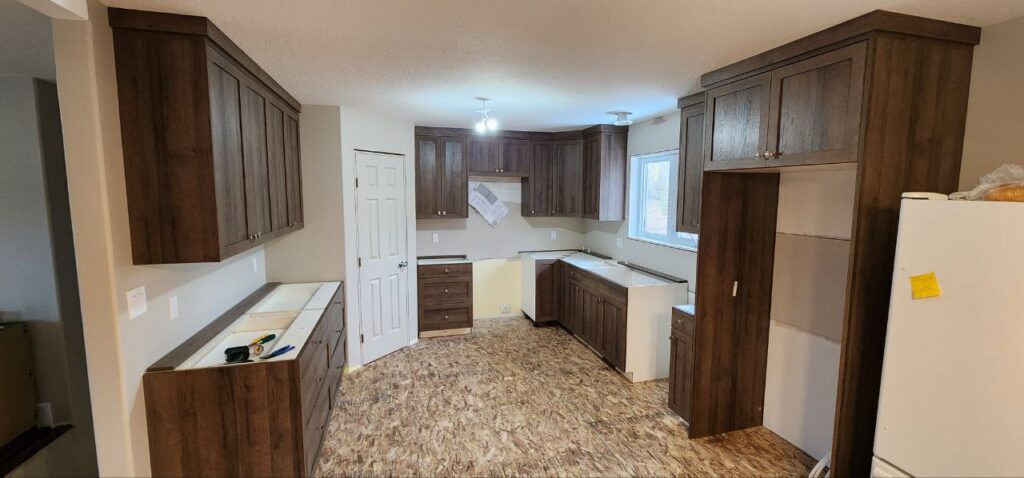 Dark wooden cabinets installation in a small kitchen