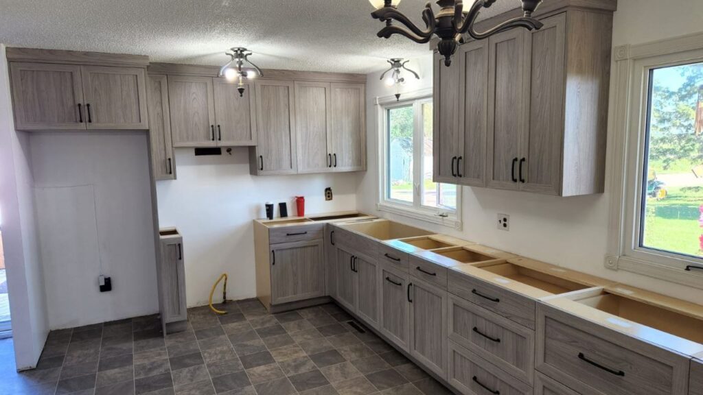 grey marble design kitchen cabinets installation in a new kitchen