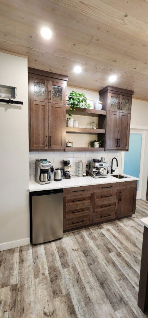 Dark brown minimalistic cabinets with plants