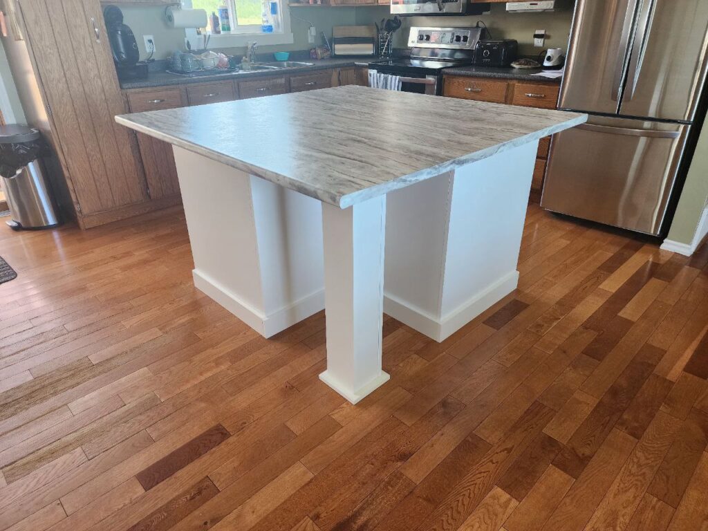 cabinet storage with a grey marble countertop